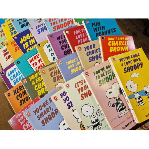 5 - Approx. 48 Coronet paperback Peanuts volumes by Schulz