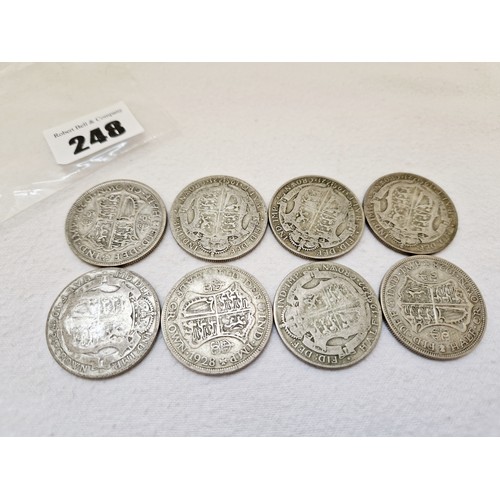 248 - Eight George V half crowns 1921 - 1929