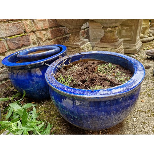 442 - Three various glazed blue terracotta planters