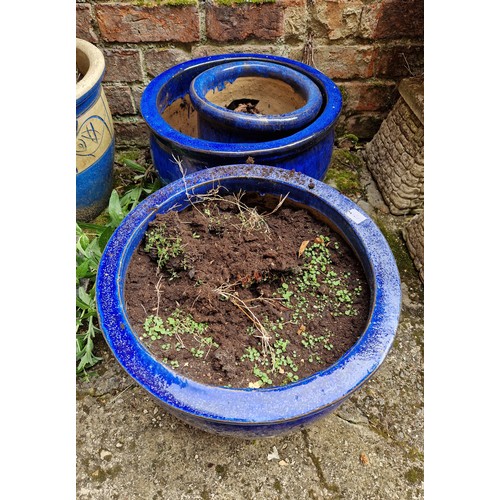 442 - Three various glazed blue terracotta planters