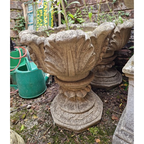 447 - Pair of simulated stone acanthus leaf pedestal urns