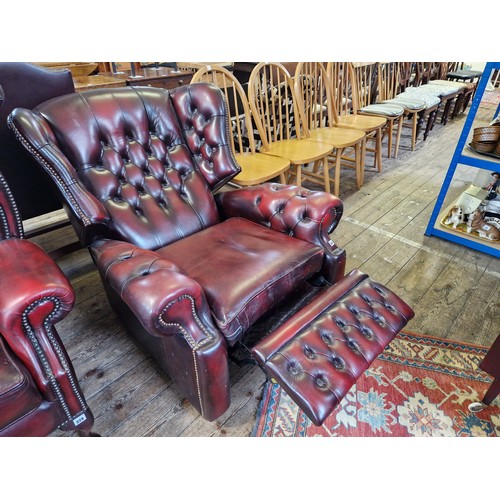 330 - Modern maroon leather buttoned back reclining arm chair