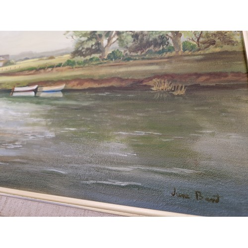 28 - Oil on canvas of a rural river scene signed June Bent lower right