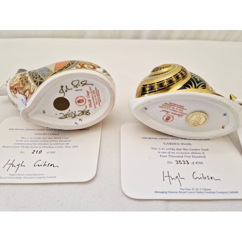 38 - Two Royal Crown Derby paperweights with certificates Garden Snail, gold stopper and Welsh Corgi, mis... 