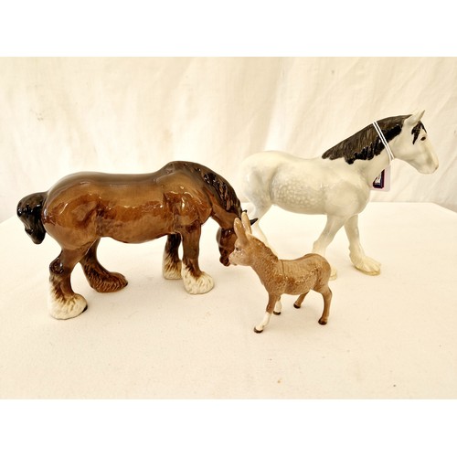 63 - Three Beswick gloss figurines, donkey and two shire horses (repair to one shire leg)