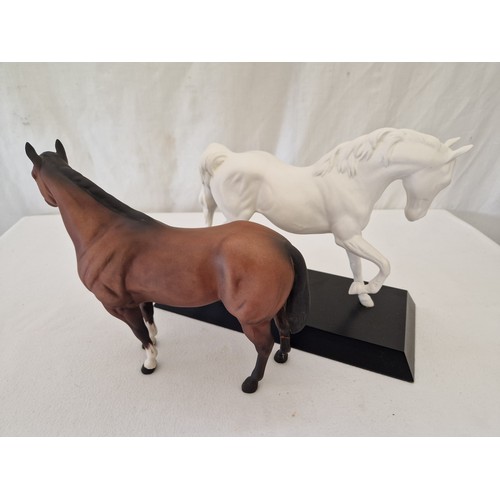 69 - Beswick bisque plinth mounted Spirit of Freedom horse figurine and a bisque stallion