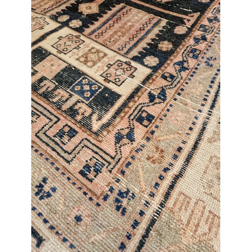 272 - Multi coloured geometric pattern woollen rug approx. 245cm x 130cm