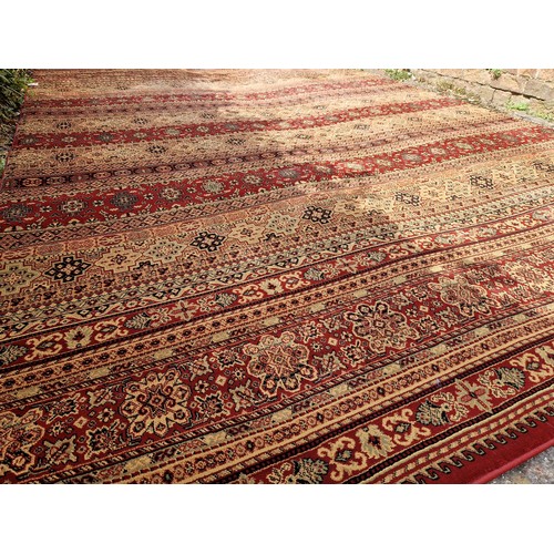 276 - Modern Kendra Egyptian polypropylene red and brown banded rug approx. 340cm x 240cm