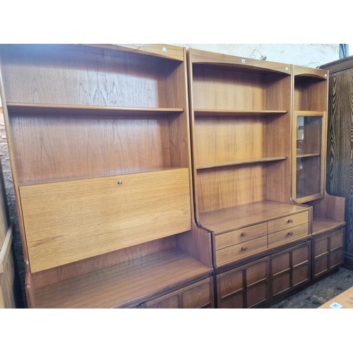 357 - Three vintage Nathan teak wall units with lattice front cupboards