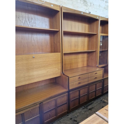 357 - Three vintage Nathan teak wall units with lattice front cupboards