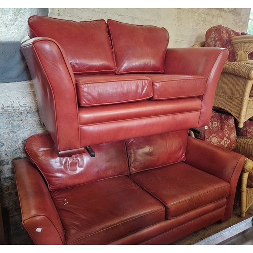 359 - Modern red leather two-piece suite comprising two- and three- seater settees