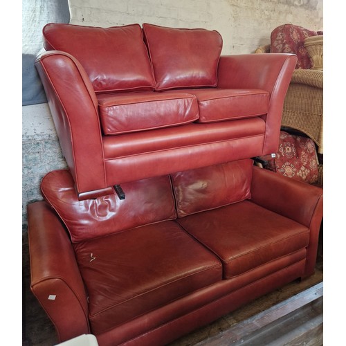 359 - Modern red leather two-piece suite comprising two- and three- seater settees