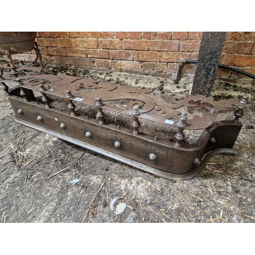 379 - Late Victorian fender with pierced metal decoration depicting unicorns on baluster supports approx. ... 