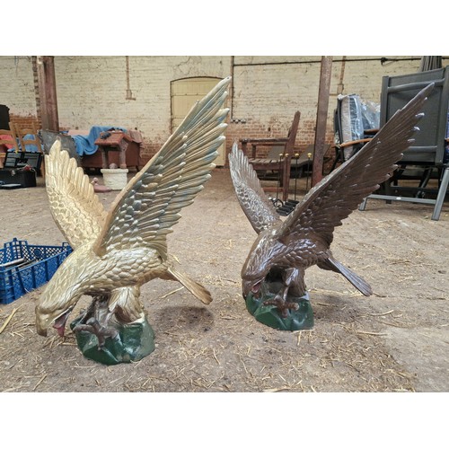 385 - Pair of large cast metal painted eagles approx. 2' x 3'