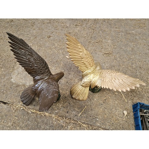 385 - Pair of large cast metal painted eagles approx. 2' x 3'