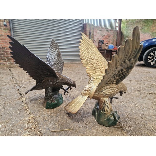 385 - Pair of large cast metal painted eagles approx. 2' x 3'