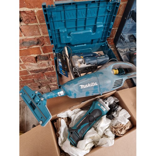 482 - Three Makita power tools, boxed DGA452Z cordless angle grinder; cased 110V GST85PBAE jigsaw and cord... 