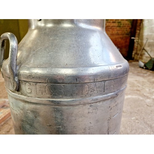 516 - Loucester, Glos. Dairy Supplies galvanised milk churn and watering can