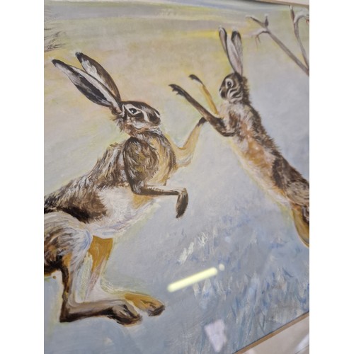 21 - Acrylic of boxing hares by C. Jones