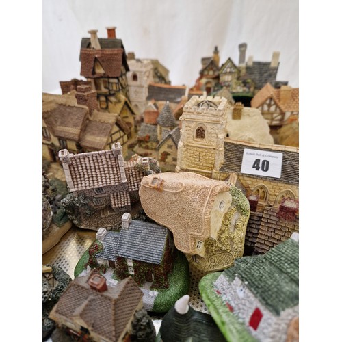 40 - Qty of ornamental houses and churches including David Winter and Lilliput Lane