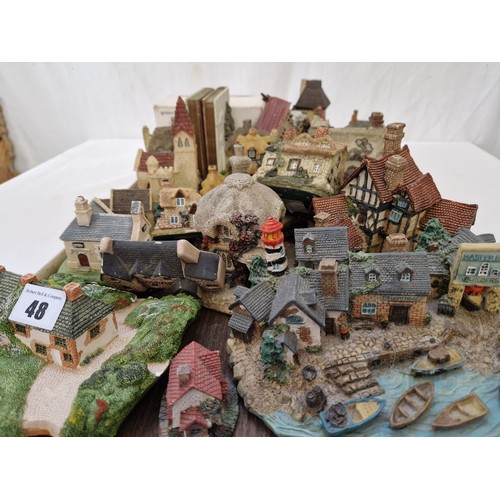 48 - Qty of ornamental houses and churches incl. Lilliput Lane