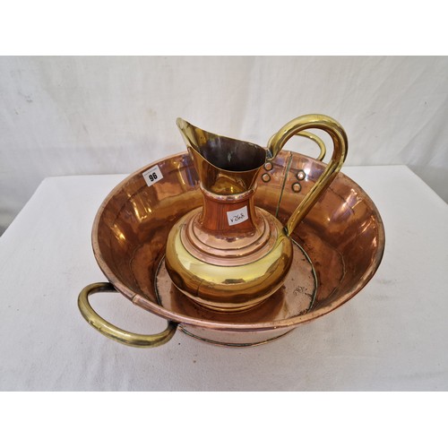 96 - Copper and brass ware comprising two handled pancheon and ornamental jug