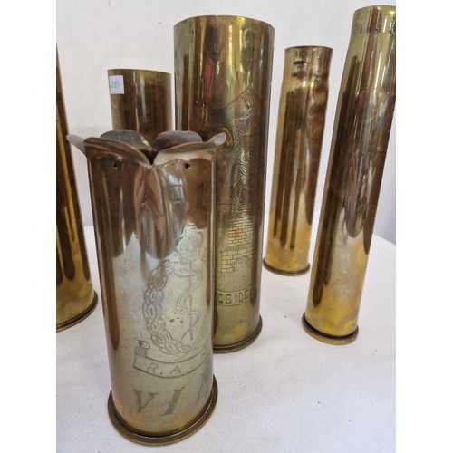 105 - Collection of seven various WWI and other shell cases, incl. two with trench art