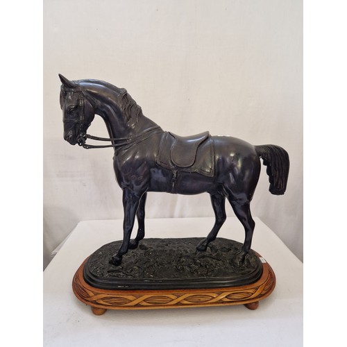 132 - Spelter figure of a saddled stallion on plinth signed (unclear)1855 approx. 55cm tall