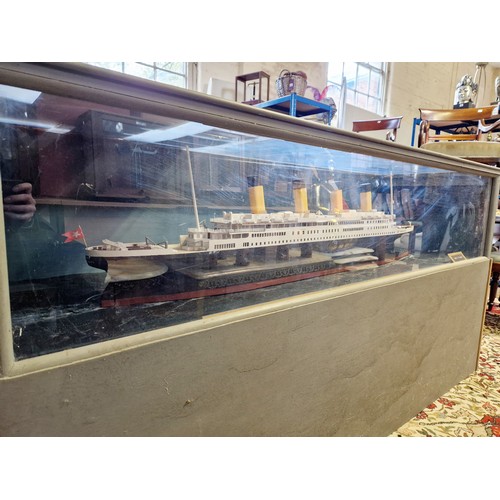 171 - Model of RMS Titanic in cabinet with illumination; wooden home built, case 6' (w) x 37.5