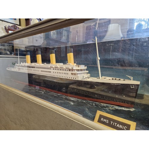 171 - Model of RMS Titanic in cabinet with illumination; wooden home built, case 6' (w) x 37.5