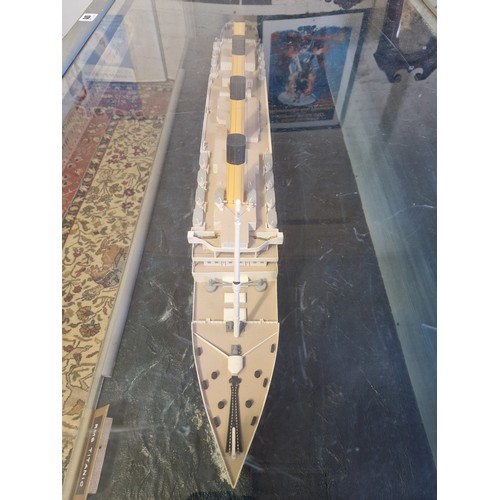 171 - Model of RMS Titanic in cabinet with illumination; wooden home built, case 6' (w) x 37.5