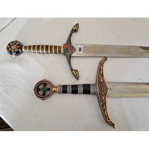 196 - Two modern ornamental medieval style swords