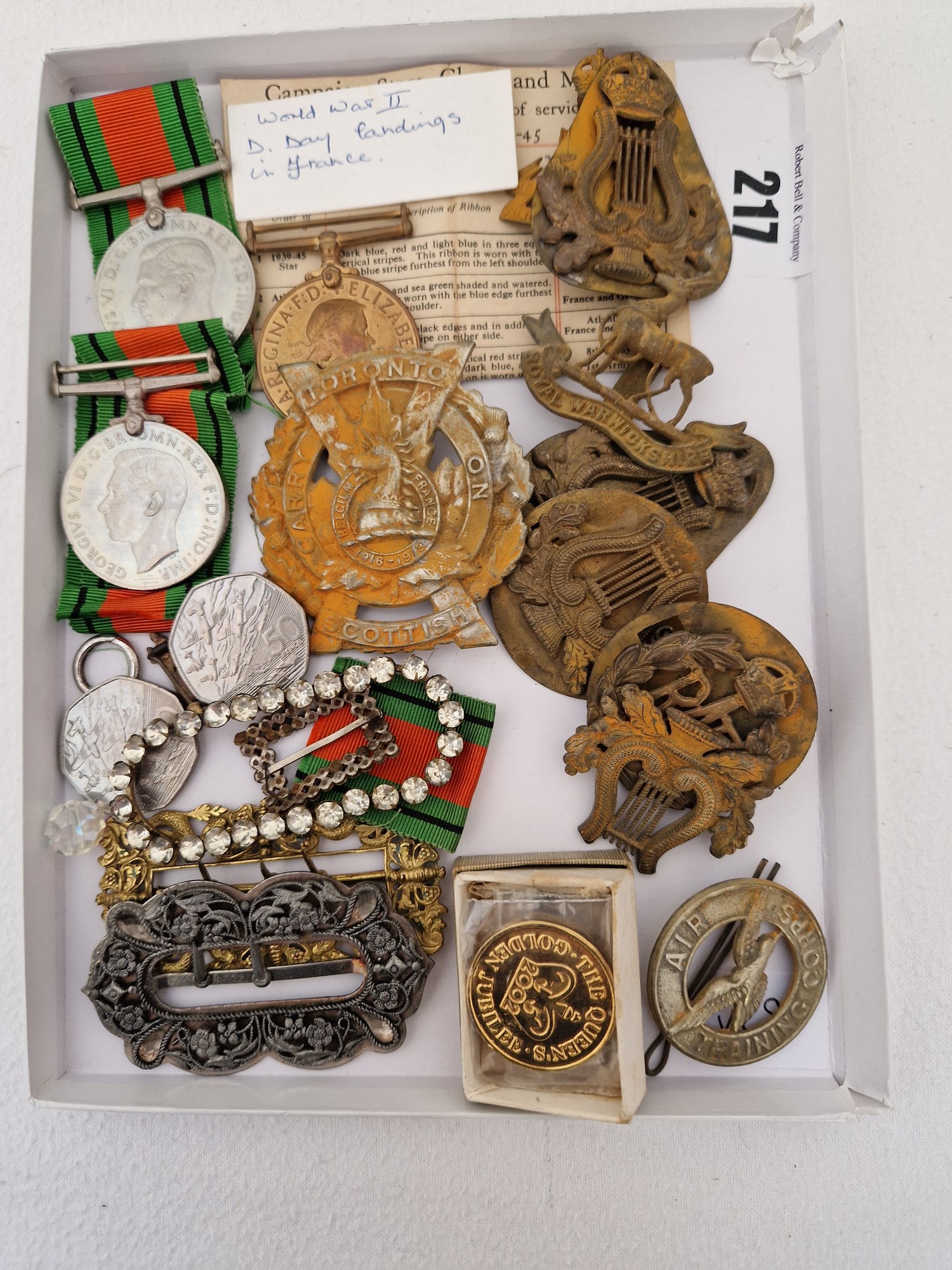 Collection of military GB cap badges, coins, medals etc. including two