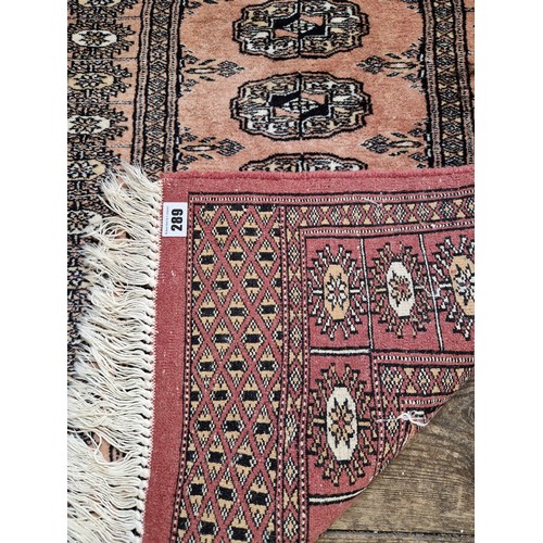 289 - Afghan pink woollen runner approx. 187cm x 65cm