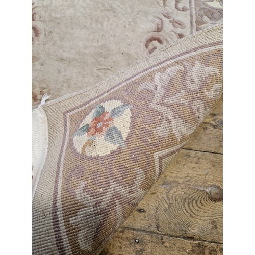 293 - Chinese floral patterned rectangular woollen rug approx. 194cm x 93cm