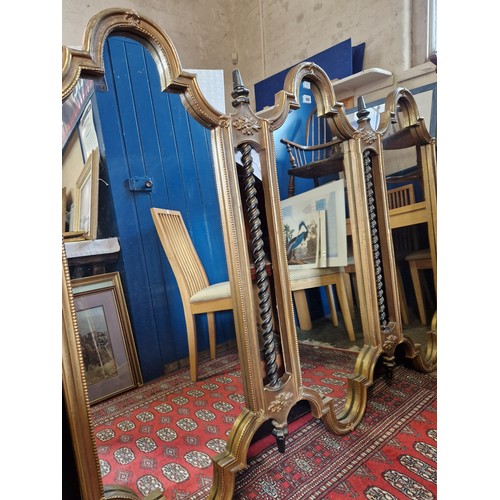 297 - Reproduction gilt and ebony ornate three panel wall mirror approx. 160cm (w) x 122cm (h)