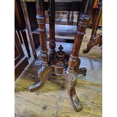 353 - Victorian mahogany inlaid oval occasional table  with four pillar supports to finial base and four s... 