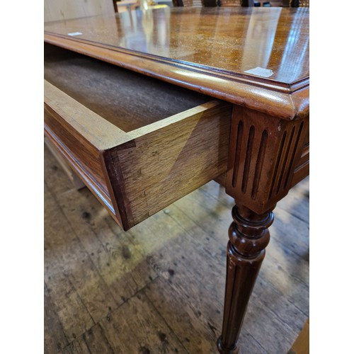 366 - Reproduction mahogany rectangular side table with single drawer on turned and fluted legs