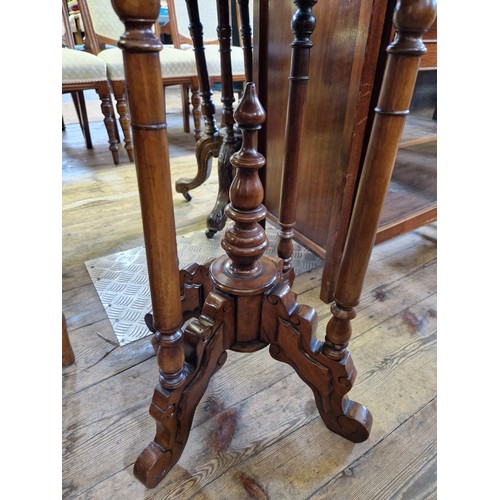 373 - Reproduction mahogany circular occasional table on 4 pillar supports to scrolling feet and finial