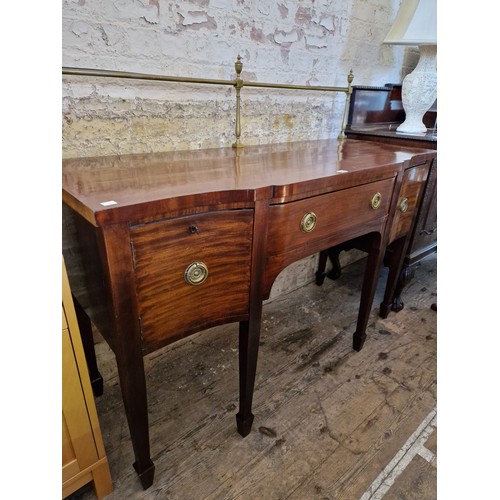 429 - Early 20th century reproduction sideboard with brass gallery over a central drawer flanked by 2 cupb... 