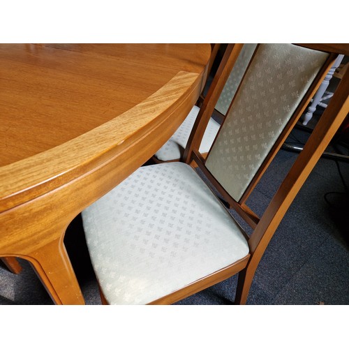 452 - Nathan vintage teak dining set comprising 6 (4+2) upholstered dining chairs and a d-ended extending ... 