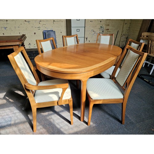 452 - Nathan vintage teak dining set comprising 6 (4+2) upholstered dining chairs and a d-ended extending ... 