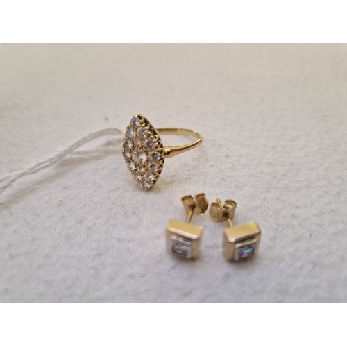 236 - A yellow metal inset ring and pair of earrings