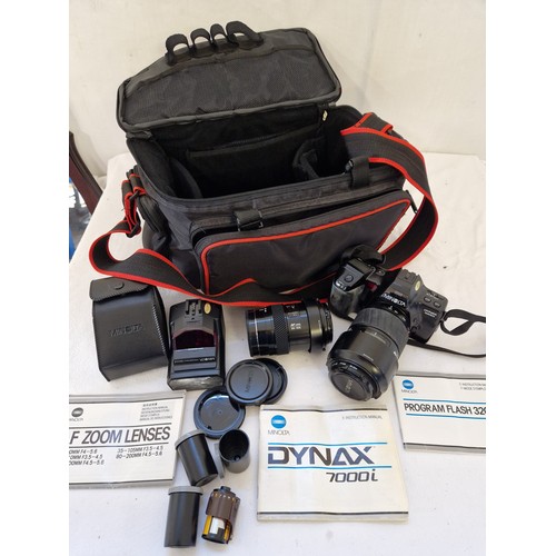 164 - Minolta Cased Minolta Dynax 7000i 35mm camera with lenses, flash, film