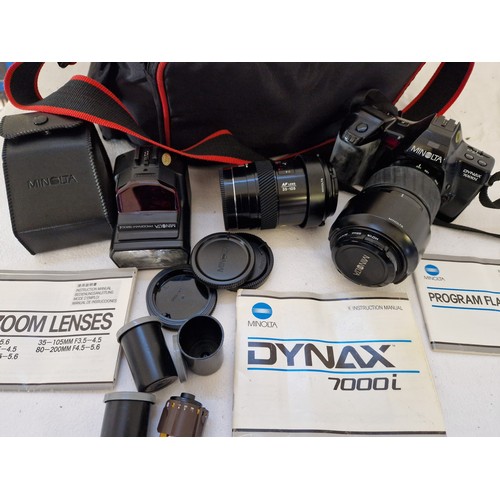 164 - Minolta Cased Minolta Dynax 7000i 35mm camera with lenses, flash, film