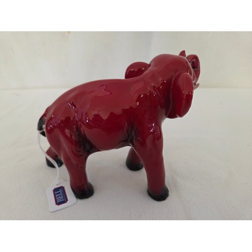 26 - Red Royal Doulton Flambé African elephant figurine