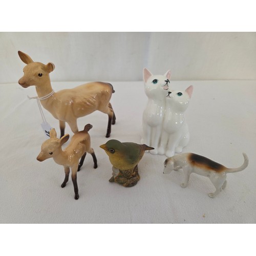 27 - Collection of five various Beswick figurines comprising gloss Doe and Fawn, gloss foxhound, Little L... 