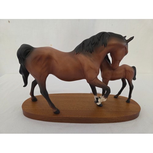 28 - Beswick bisque 'Spirit of Affection' group on plinth