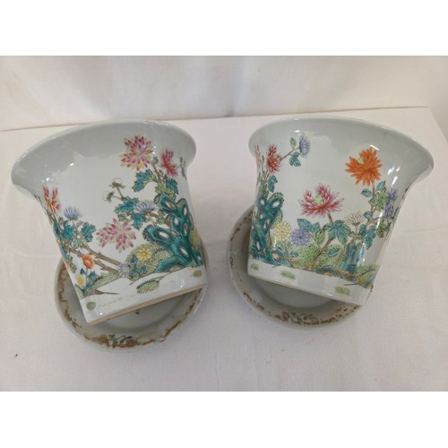 36 - Pair of Chinese floral chrysanemum jardinières and saucers signed to the base (one slightly taller t... 