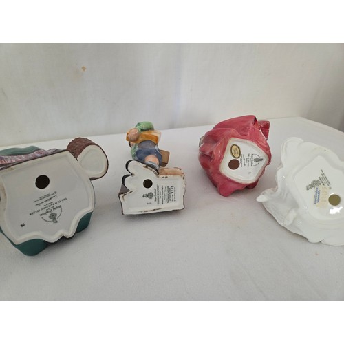 38 - Four Royal Doulton figurines comprising Top of the Hill; The Old Balloon Seller; Heather and The Boy... 